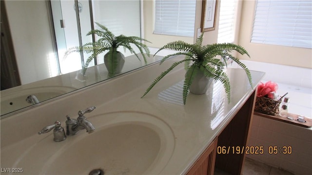 1504 Andrew David Ave, North Las Vegas, NV 89086 - bathroom view of double vanity and a bath