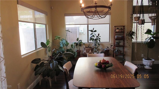 1504 Andrew David Ave, North Las Vegas, NV 89086 - dining space featuring a chandelier and baseboards