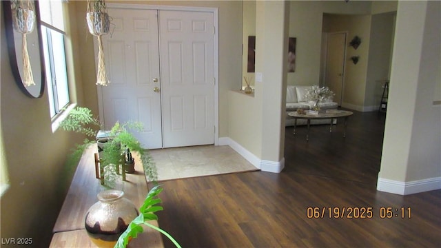 1504 Andrew David Ave, North Las Vegas, NV 89086 - entryway with baseboards and wood finished floors