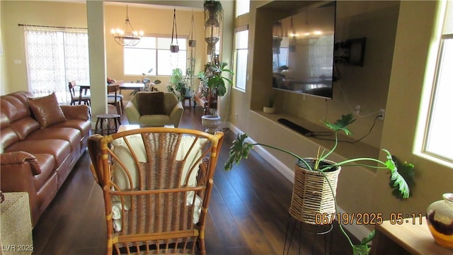 1504 Andrew David Ave, North Las Vegas, NV 89086 - living room with a chandelier and hardwood / wood-style floors