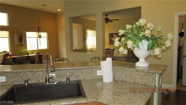 1504 Andrew David Ave, North Las Vegas, NV 89086 - kitchen with a ceiling fan, light stone counters, and recessed lighting