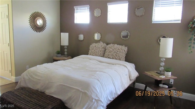 1504 Andrew David Ave, North Las Vegas, NV 89086 - bedroom with baseboards and wood finished floors
