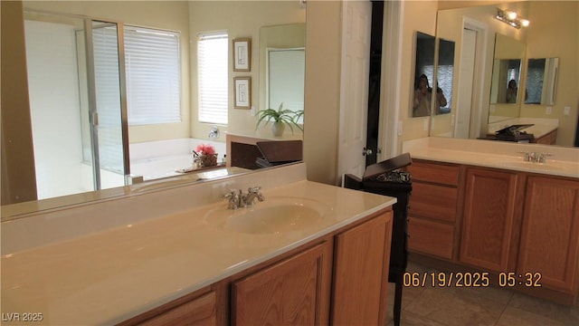1504 Andrew David Ave, North Las Vegas, NV 89086 - full bath featuring two vanities, a bath, and tile patterned floors