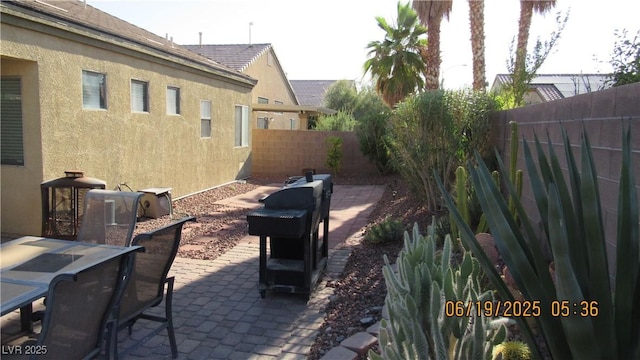 1504 Andrew David Ave, North Las Vegas, NV 89086 - fenced backyard featuring a patio and outdoor dining space