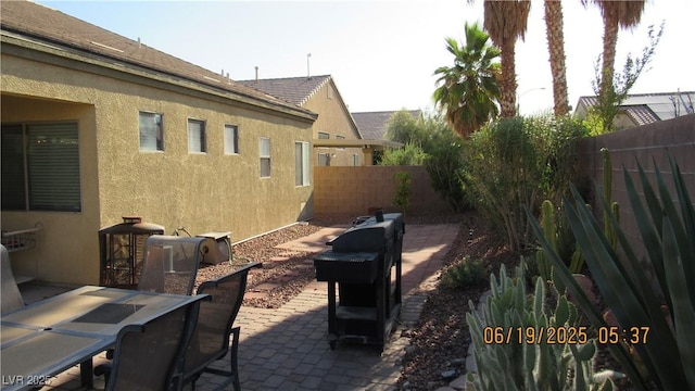 1504 Andrew David Ave, North Las Vegas, NV 89086 - fenced backyard featuring a patio area and outdoor dining space