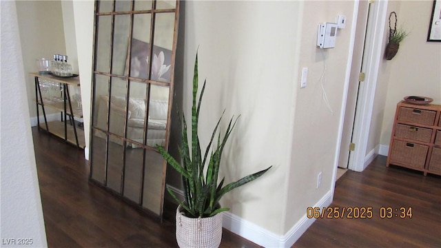 1504 Andrew David Ave, North Las Vegas, NV 89086 - corridor featuring dark wood-style floors and baseboards