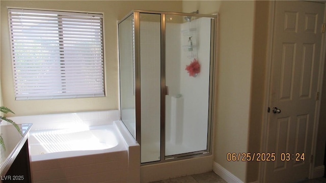 1504 Andrew David Ave, North Las Vegas, NV 89086 - full bath featuring a stall shower, a garden tub, and tile patterned flooring