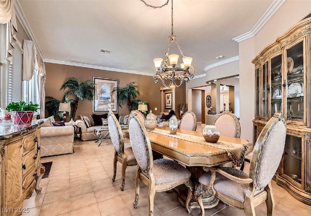 8698 Waterford Bend St, Las Vegas, NV 89123 - dining area featuring a chandelier, ornamental molding, and light tile patterned flooring