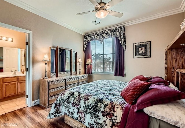 8698 Waterford Bend St, Las Vegas, NV 89123 - bedroom with crown molding, light wood finished floors, ensuite bathroom, and ceiling fan