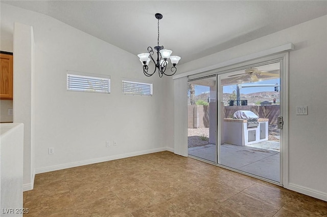 2059 Joy View Ln, Henderson, NV 89012 - unfurnished dining area with vaulted ceiling, a chandelier, and ceiling fan