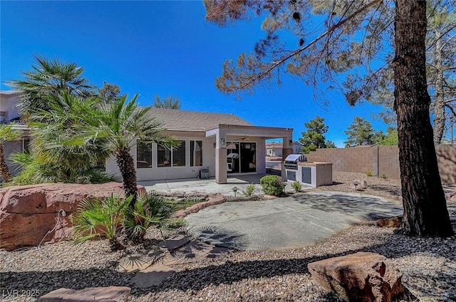 2059 Joy View Ln, Henderson, NV 89012 - rear view of house featuring area for grilling, a patio area, and stucco siding