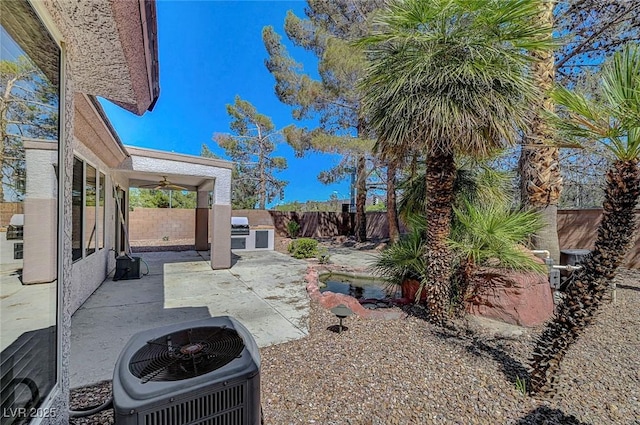 2059 Joy View Ln, Henderson, NV 89012 - fenced backyard featuring a patio and a ceiling fan