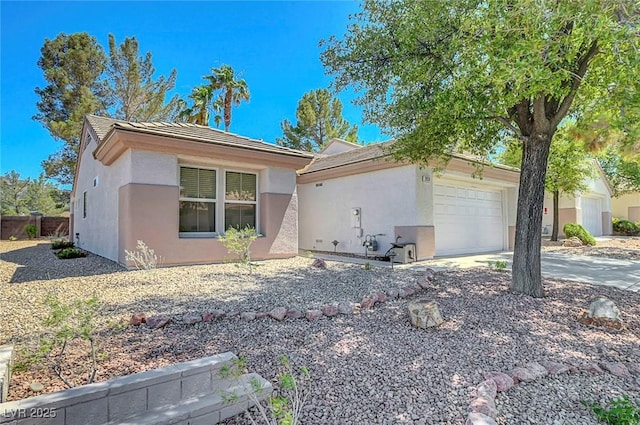 2059 Joy View Ln, Henderson, NV 89012 - ranch-style house featuring stucco siding and a garage