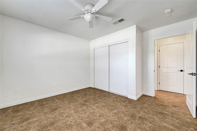 2059 Joy View Ln, Henderson, NV 89012 - unfurnished bedroom featuring a closet and a ceiling fan
