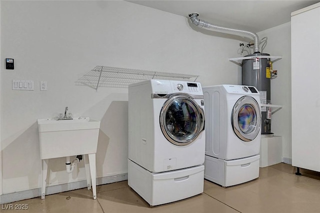 2059 Joy View Ln, Henderson, NV 89012 - washroom featuring electric water heater and washer and clothes dryer