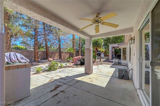 2059 Joy View Ln, Henderson, NV 89012 - fenced backyard featuring ceiling fan and a patio area