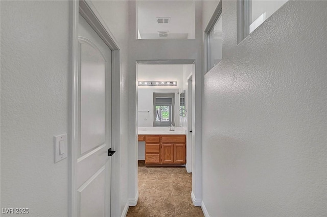 2059 Joy View Ln, Henderson, NV 89012 - hallway featuring a textured wall