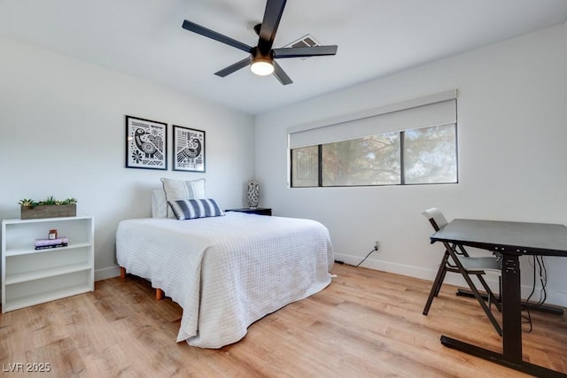 1926 Navarre Ln, Henderson, NV 89014 - bedroom with light wood-style floors and a ceiling fan