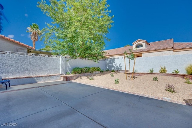 1926 Navarre Ln, Henderson, NV 89014 - fenced backyard with a patio area
