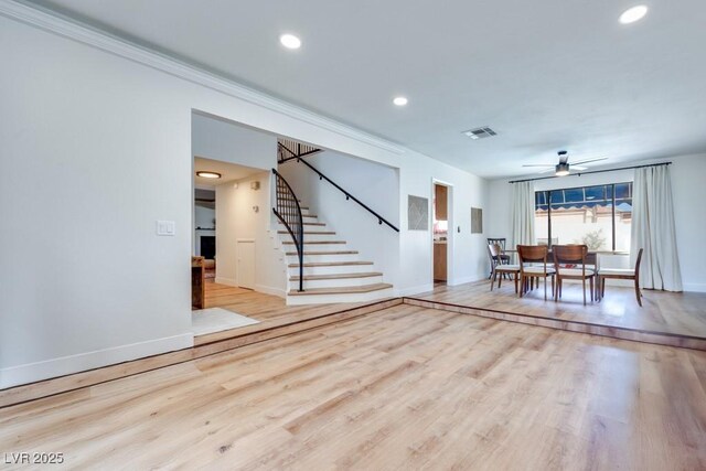 1926 Navarre Ln, Henderson, NV 89014 - living room with stairs, a ceiling fan, wood finished floors, and recessed lighting