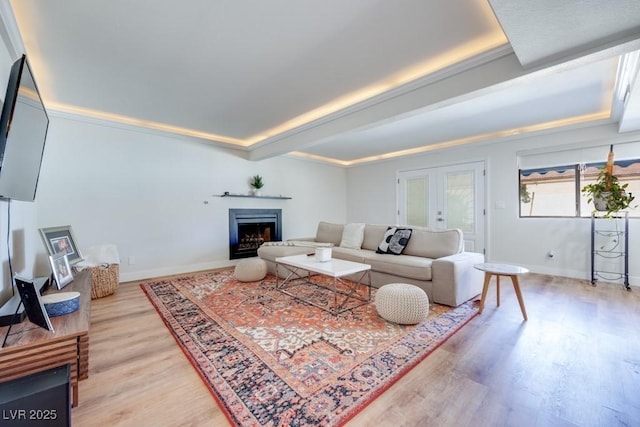 1926 Navarre Ln, Henderson, NV 89014 - living area featuring light wood-style floors, french doors, and a fireplace