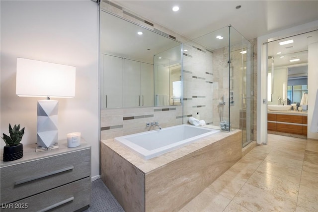 3722 Las Vegas Blvd Unit 2512E, Las Vegas, NV 89158 - full bathroom with a stall shower, a garden tub, vanity, recessed lighting, and tile patterned flooring