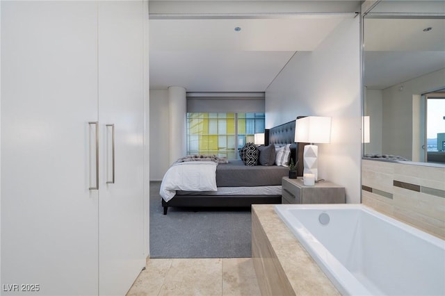 3722 Las Vegas Blvd Unit 2512E, Las Vegas, NV 89158 - bedroom featuring light colored carpet and light tile patterned floors