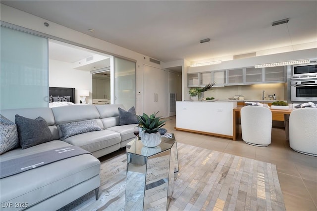 3722 Las Vegas Blvd Unit 2512E, Las Vegas, NV 89158 - living room featuring light tile patterned flooring