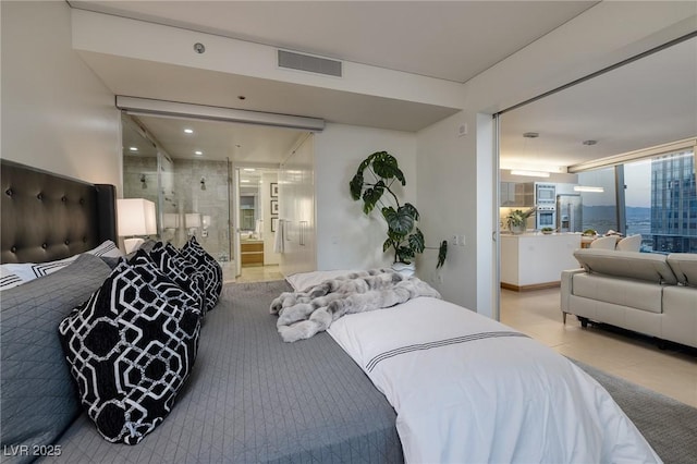 3722 Las Vegas Blvd Unit 2512E, Las Vegas, NV 89158 - bedroom featuring stainless steel fridge with ice dispenser and recessed lighting