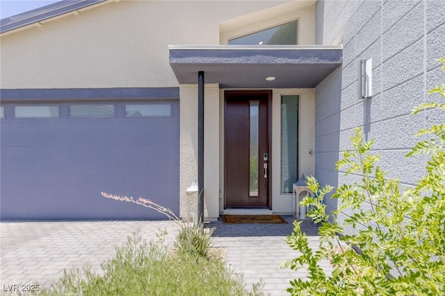 9785 Granite Mesa St, Las Vegas, NV 89141 - view of exterior entry featuring stucco siding and a garage