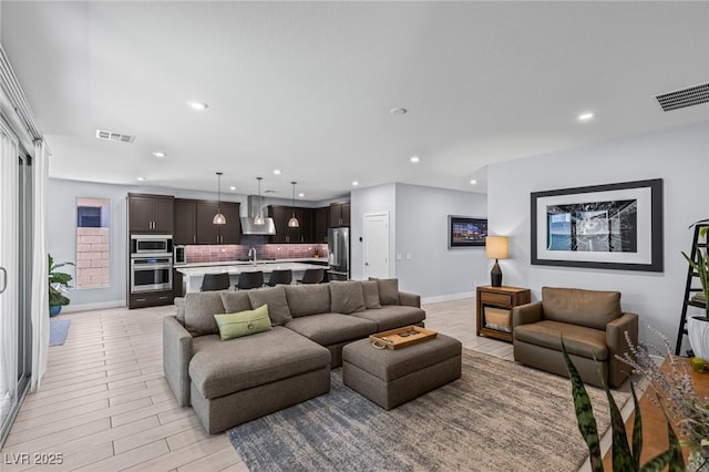 9785 Granite Mesa St, Las Vegas, NV 89141 - living room featuring recessed lighting and light wood-style floors