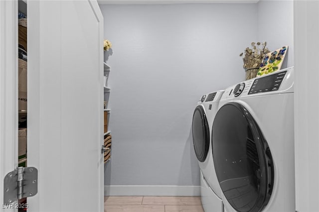 9785 Granite Mesa St, Las Vegas, NV 89141 - laundry area with separate washer and dryer and baseboards