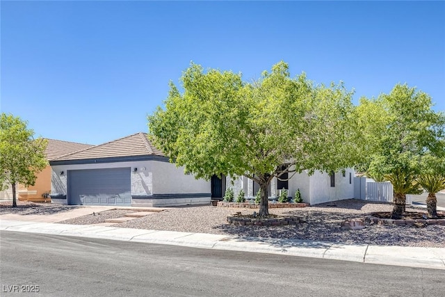 9100 Shelter Cove Ct, Las Vegas, NV 89117 - view of front of property with a garage, stucco siding, and a tile roof