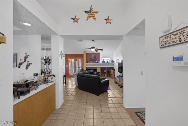 9100 Shelter Cove Ct, Las Vegas, NV 89117 - living room featuring light tile patterned floors and a ceiling fan