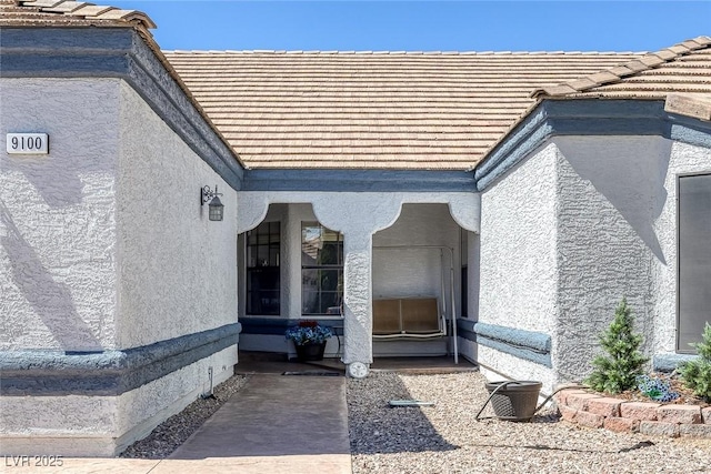 9100 Shelter Cove Ct, Las Vegas, NV 89117 - entrance to property featuring stucco siding and a tile roof