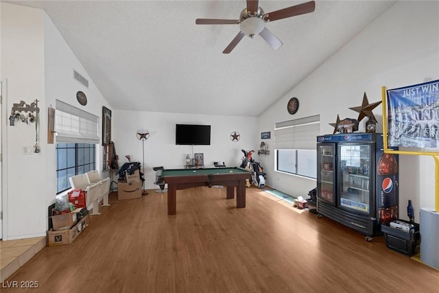 9100 Shelter Cove Ct, Las Vegas, NV 89117 - game room featuring wood finished floors, pool table, ceiling fan, and high vaulted ceiling