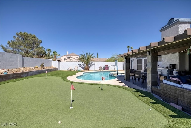 9100 Shelter Cove Ct, Las Vegas, NV 89117 - view of pool featuring an area to practice putting, a patio, and a fenced backyard
