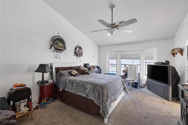 9100 Shelter Cove Ct, Las Vegas, NV 89117 - bedroom with a textured ceiling, carpet, ceiling fan, and vaulted ceiling