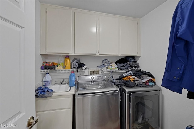9100 Shelter Cove Ct, Las Vegas, NV 89117 - laundry area with independent washer and dryer and cabinet space