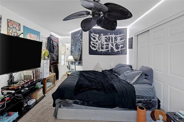 9100 Shelter Cove Ct, Las Vegas, NV 89117 - carpeted bedroom featuring a ceiling fan and a closet