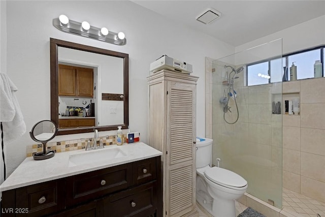 9100 Shelter Cove Ct, Las Vegas, NV 89117 - bathroom with a tile shower and vanity