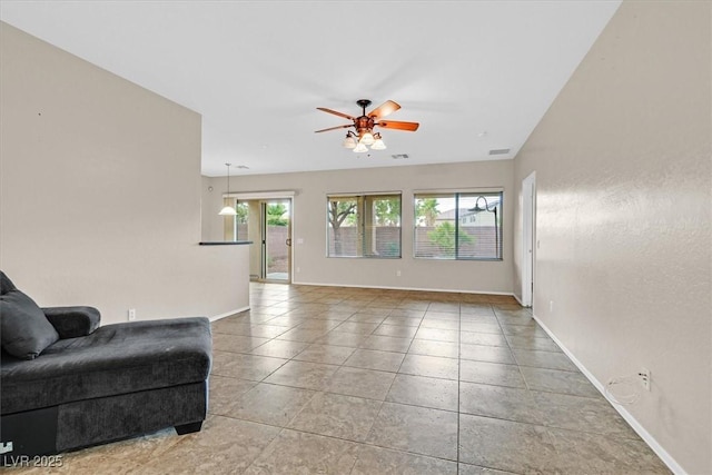 3720 Tack St, Las Vegas, NV 89122 - living room featuring ceiling fan and tile patterned flooring