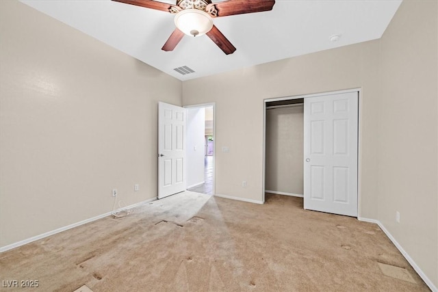 3720 Tack St, Las Vegas, NV 89122 - unfurnished bedroom featuring light colored carpet, a closet, and ceiling fan