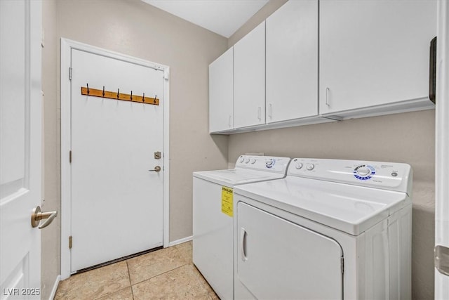 3720 Tack St, Las Vegas, NV 89122 - laundry area featuring washer and dryer, cabinet space, and light tile patterned floors