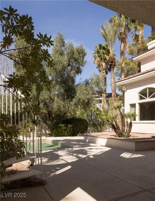 2041 Troon Dr, Henderson, NV 89074 - view of property's community with a patio area and a swimming pool
