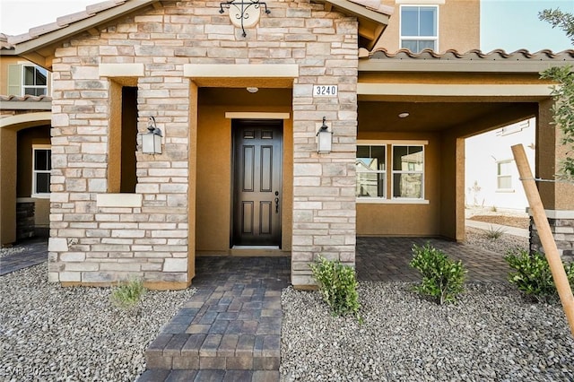 3240 Avernus Ave, Henderson, NV 89044 - entrance to property featuring stone siding and stucco siding