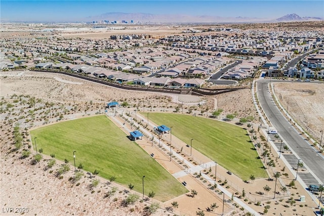 3240 Avernus Ave, Henderson, NV 89044 - aerial view of property's location featuring a mountain backdrop and nearby suburban area