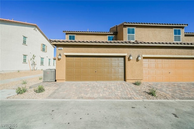 3240 Avernus Ave, Henderson, NV 89044 - view of front facade featuring stucco siding, decorative driveway, and a tiled roof