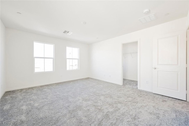 3240 Avernus Ave, Henderson, NV 89044 - unfurnished bedroom with carpet flooring, a walk in closet, and a closet