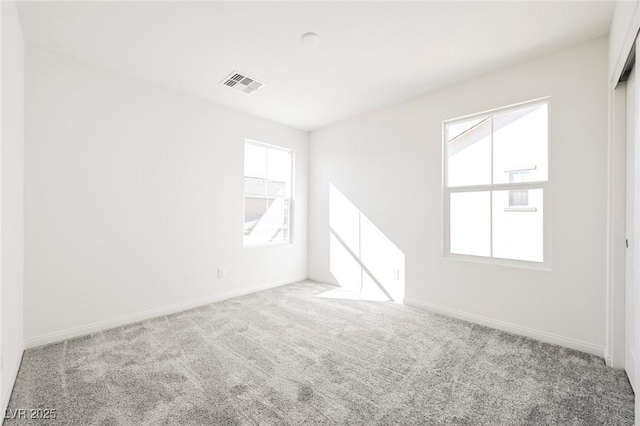 3240 Avernus Ave, Henderson, NV 89044 - spare room featuring healthy amount of natural light and carpet